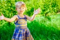Happy child blowing bubbles on nature in pairs Royalty Free Stock Photo