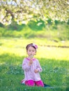 Happy child blowing dandelion outdoors in spring Royalty Free Stock Photo