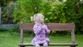 Happy child blowing soap bubbles