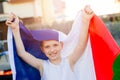 Happy child boy with France national flag