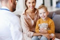 Happy child boy patient with his mother at reception of a friendly pediatrician family doctor family pediatrician Royalty Free Stock Photo