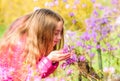 Happy child with cherry bloom. Natural beauty. Childhood happiness. summer nature. Sakura. little girl smell blooming Royalty Free Stock Photo