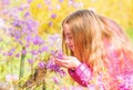 Happy child with cherry bloom. Natural beauty. Childhood happiness. summer nature. Sakura. little girl smell blooming Royalty Free Stock Photo