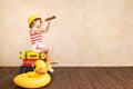 Happy child dreaming about summer vacation and travel Royalty Free Stock Photo