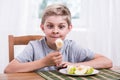 Happy child eating banana Royalty Free Stock Photo