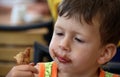 Happy child eats ice cream Royalty Free Stock Photo