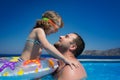 Happy child with father in swimming pool Royalty Free Stock Photo