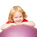 Happy child with fitness ball playing sports. Royalty Free Stock Photo