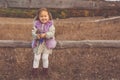 Happy child girl in autumn filed