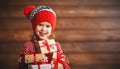 Happy child girl with Christmas present Royalty Free Stock Photo