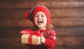 Happy child girl with Christmas present Royalty Free Stock Photo