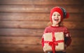 Happy child girl with Christmas present Royalty Free Stock Photo