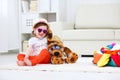 Happy child girl collect suitcase on vacation Royalty Free Stock Photo