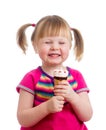 Happy child girl eating ice cream in studio isolated Royalty Free Stock Photo