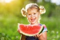 Happy child girl eats watermelon Royalty Free Stock Photo