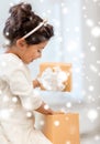 Happy child girl with gift box Royalty Free Stock Photo
