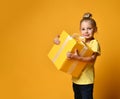 Happy child girl with gift box