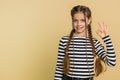Happy child girl kid showing ok gesture like sign positive feedback, celebrate victory approve idea Royalty Free Stock Photo