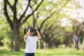 Happy child girl playing with binoculars. explore and adventure concept Royalty Free Stock Photo