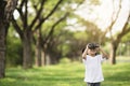 Happy child girl playing with binoculars. explore and adventure concept Royalty Free Stock Photo