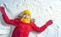 Kid making snow angel. Royalty Free Stock Photo