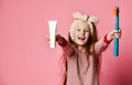 Happy child girl with toothbrush brushes teeth and smiles Royalty Free Stock Photo