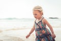 Happy child girl walking on beach tropical island during summer holidays concept carefree childhood travel lifestyle Royalty Free Stock Photo