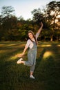 happy child girl walking in summer park - childhood, leisure and people concept. vertical photo Royalty Free Stock Photo