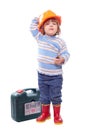 Happy child in hardhat with tools Royalty Free Stock Photo