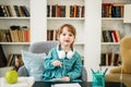 Happy child, healthy food, baby girl eating fruit at school Royalty Free Stock Photo