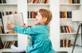 Happy child, healthy food, baby girl eating fruit at school Royalty Free Stock Photo