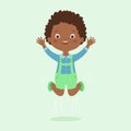 Happy child jumping happily. Black skin kid. Cheerful little boy.