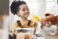 Happy child in kitchen, baking and learning with parent and cake flour on face, little baker making breakfast or cookies Royalty Free Stock Photo