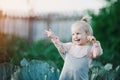 Happy Child Laugh In Cabbage Garden Summertime Royalty Free Stock Photo