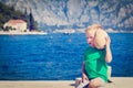 Happy child listening seashell at the beach Royalty Free Stock Photo