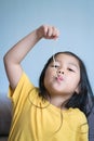 Happy Child or Little girl eating delicious noodle, kid have fun and joyful with eating Royalty Free Stock Photo