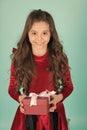 Happy child with long brunette hair hold present box Royalty Free Stock Photo