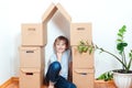 Happy child in new house. Housing a young family with kid. Family moves into a new apartment Royalty Free Stock Photo