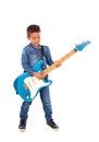 Happy child playing electric blue guitar Royalty Free Stock Photo