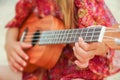 A happy child playing guitar by the sea greece on nature background Royalty Free Stock Photo