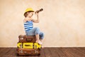 Happy child dreaming about summer vacation and travel Royalty Free Stock Photo