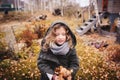 Happy child playing with leaves in autumn. Seasonal outdoor activities with kids Royalty Free Stock Photo