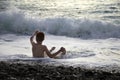 Happy child playing on the ocean. childrens vacation, vacation Royalty Free Stock Photo