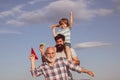 Happy child playing outdoors. Freedom to dream - joyful kid playing with airplane against the sky - vintage effect Royalty Free Stock Photo