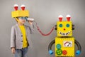 Happy child playing with robot Royalty Free Stock Photo