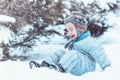 Happy child playing in the snow