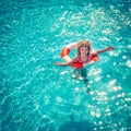 Happy child playing in swimming pool Royalty Free Stock Photo