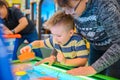 Happy child playing table air hockey Royalty Free Stock Photo