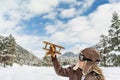 Happy child playing with toy airplane Royalty Free Stock Photo