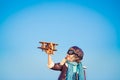 Happy child playing with toy airplane Royalty Free Stock Photo